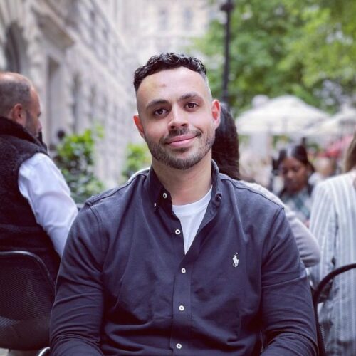 Man in London wearing blue shirt